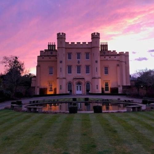 Ditton Manor front of building in evening looking purple at sunset for About Us page