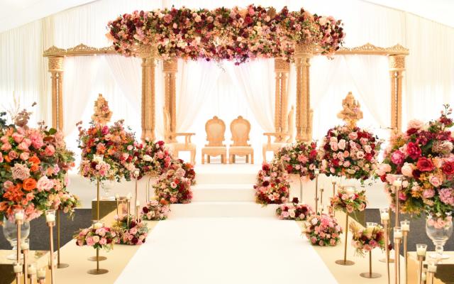 mandap asian wedding inside marquee at ditton manor in berkshire