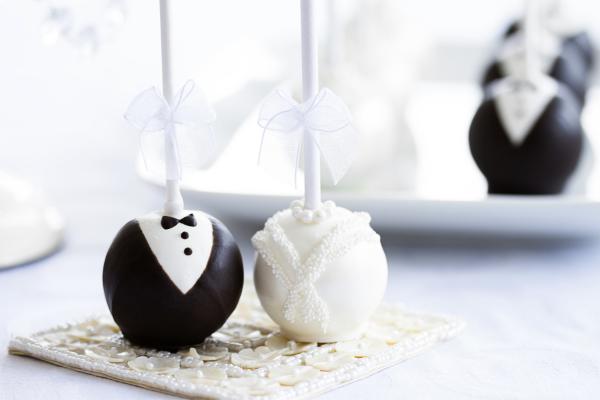 Bride and groom decorated cake pops