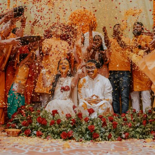 indian couple showered with rose petals indian wedding traditions