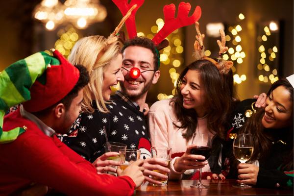 Christmas jumper party theme featuring our article on "How To Plan A Christmas Party"