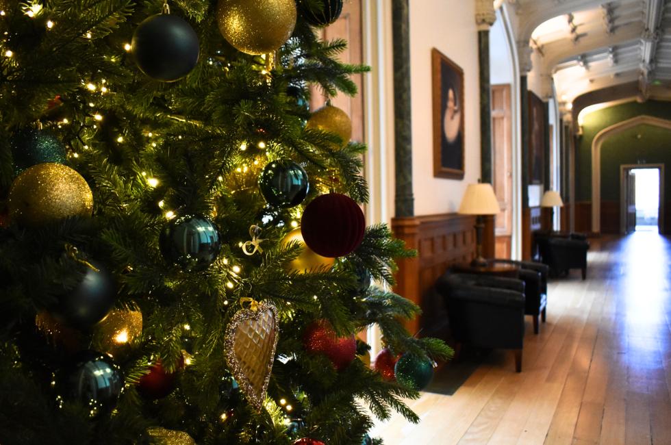 Christmas tree in Manor hallway at Ditton Manor in Berkshire